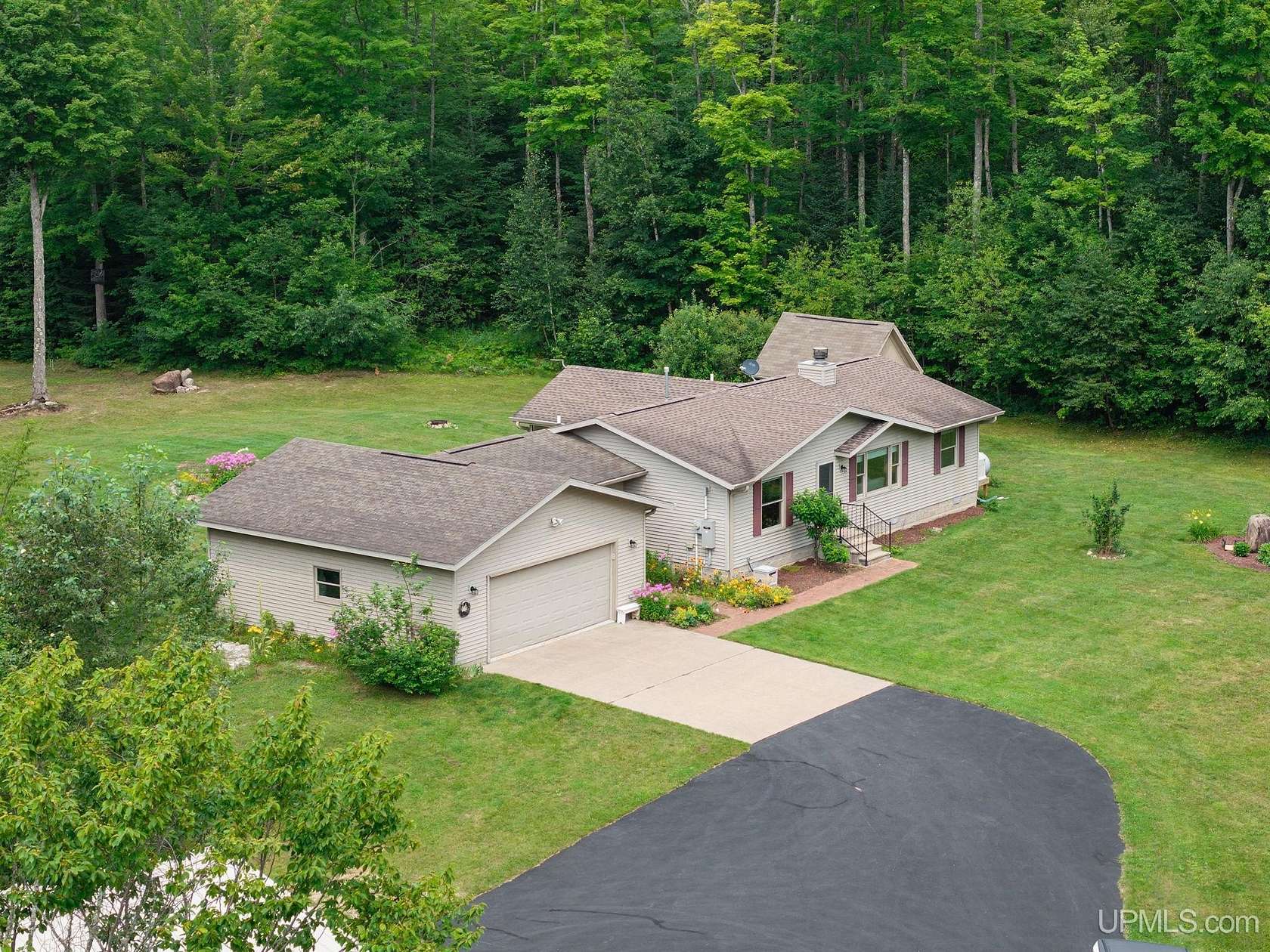 30 Acres of Recreational Land with Home for Sale in Chatham, Michigan