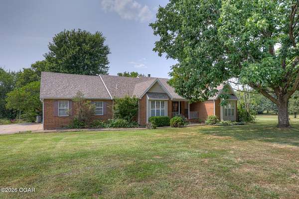 1.5 Acres of Land with Home for Sale in Carthage, Missouri