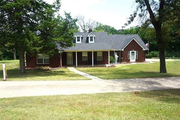1.58 Acres of Land with Home for Sale in Denison, Texas