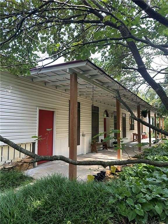 24 Acres of Land with Home for Sale in Centerview, Missouri