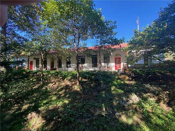23.3 Acres of Land with Home for Sale in Centerview, Missouri