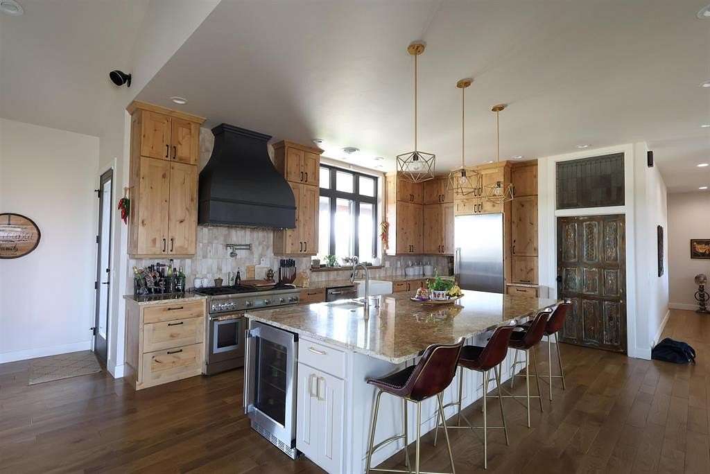5 Acres of Land with Home for Sale in Cody, Wyoming