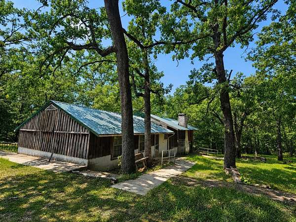 3.86 Acres of Land with Home for Sale in Pittsburg, Missouri