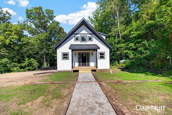 2.5 Acres of Land with Home for Sale in Twin Lake, Michigan