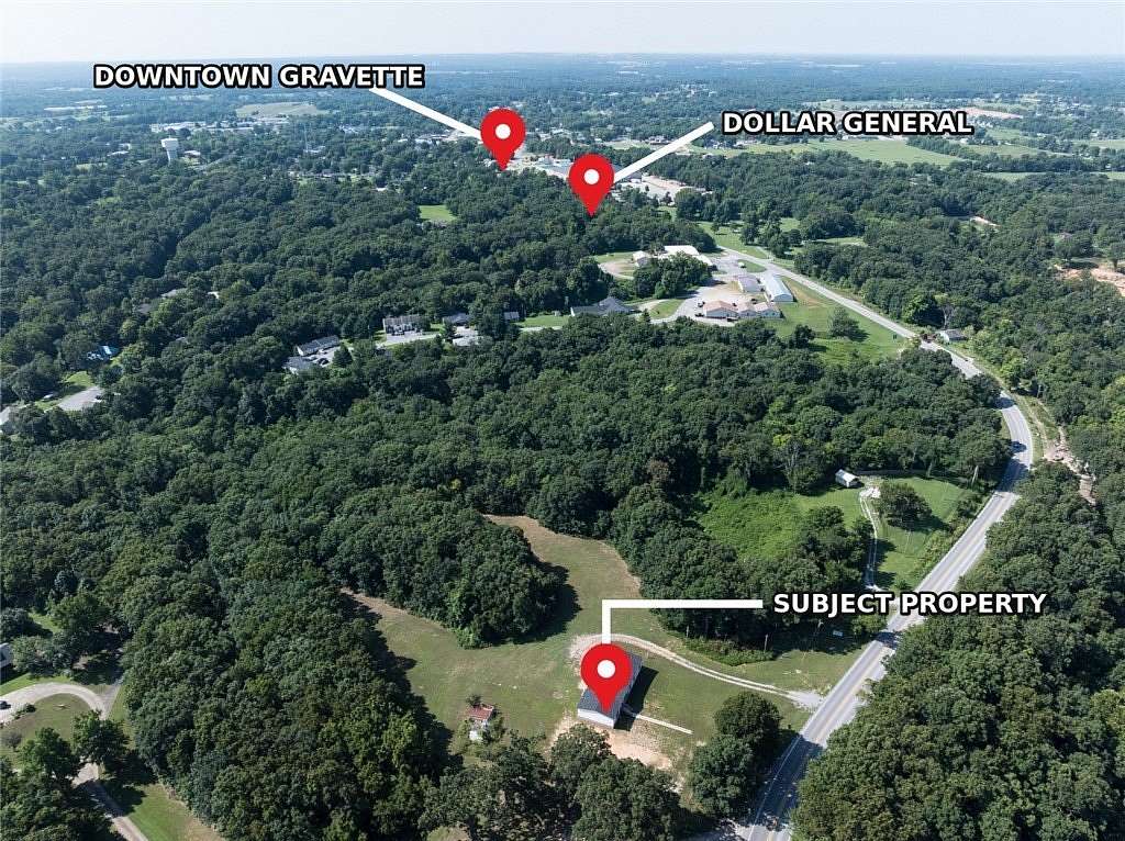 5.75 Acres of Land with Home for Sale in Gravette, Arkansas