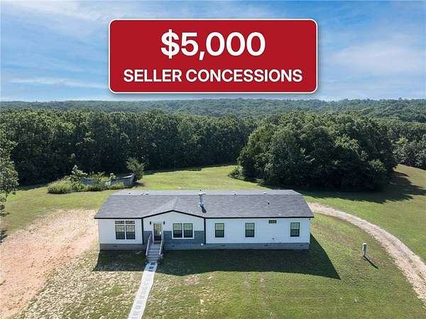 5.75 Acres of Land with Home for Sale in Gravette, Arkansas