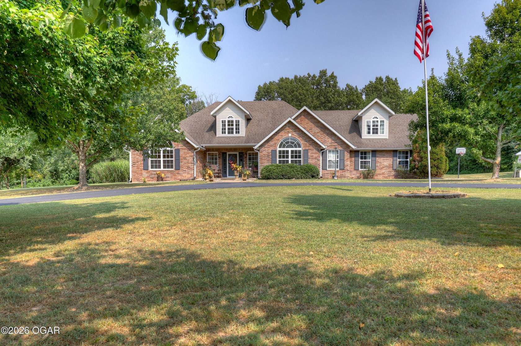 2.32 Acres of Land with Home for Sale in Carthage, Missouri
