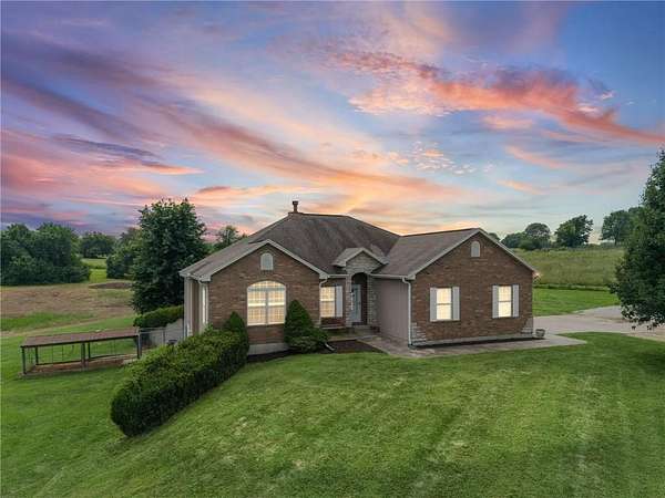5.7 Acres of Land with Home for Sale in Pleasant Hill, Missouri