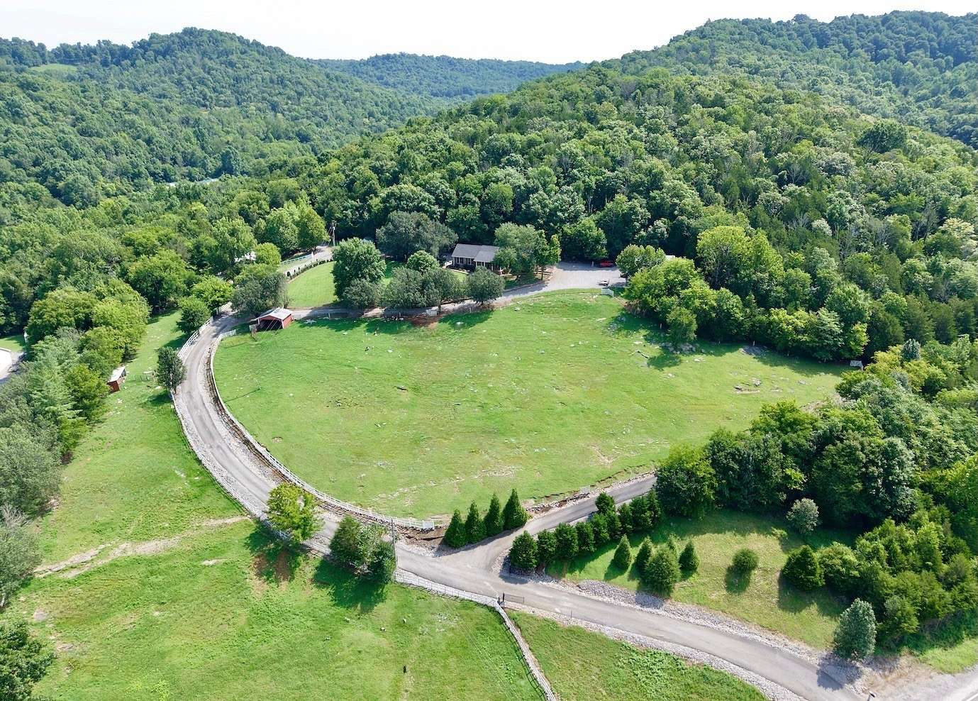 60.3 Acres of Land with Home for Sale in Dowelltown, Tennessee
