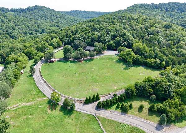 60.3 Acres of Land with Home for Sale in Dowelltown, Tennessee