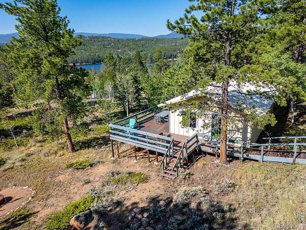 2 Acres of Land with Home for Sale in Red Feather Lakes, Colorado