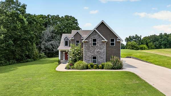 2 Acres of Land with Home for Sale in Cunningham, Tennessee