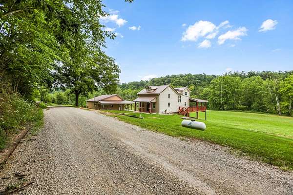 29.8 Acres of Recreational Land with Home for Sale in Crooksville, Ohio