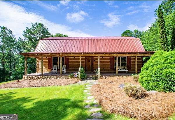 14.8 Acres of Recreational Land with Home for Sale in Carrollton, Georgia