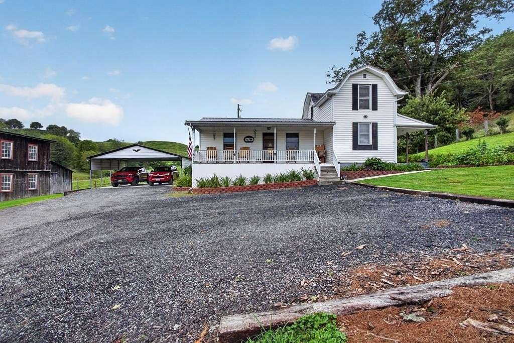 5.78 Acres of Land with Home for Sale in Mouth of Wilson, Virginia