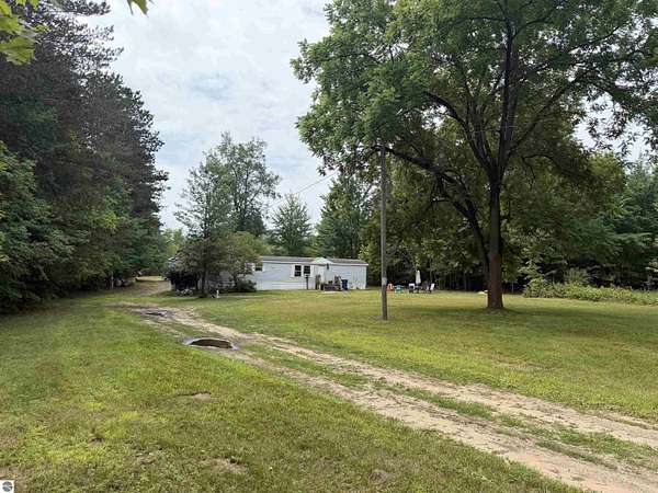 7.38 Acres of Land with Home for Sale in Copemish, Michigan