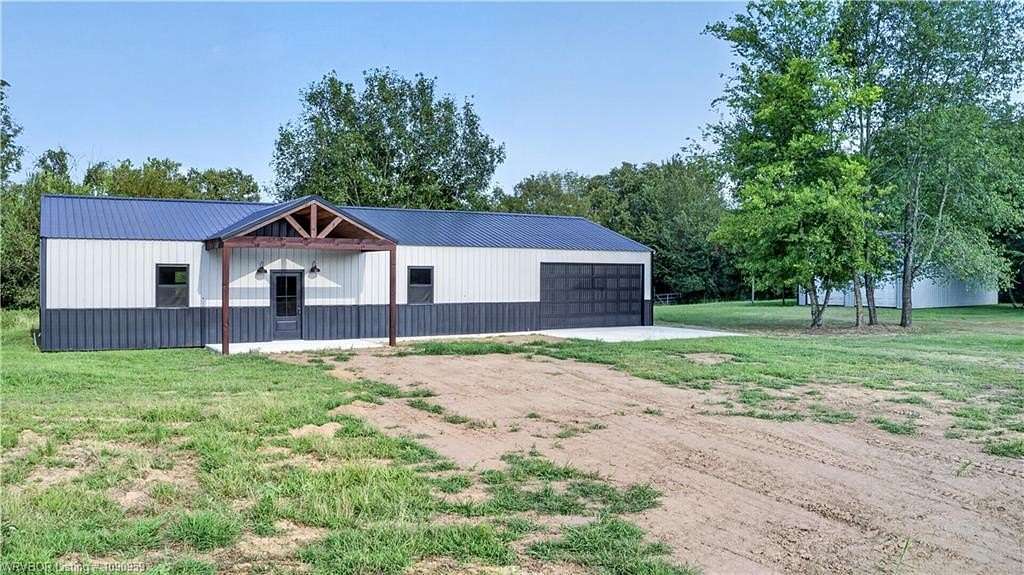 4 Acres of Land with Home for Sale in Muldrow, Oklahoma