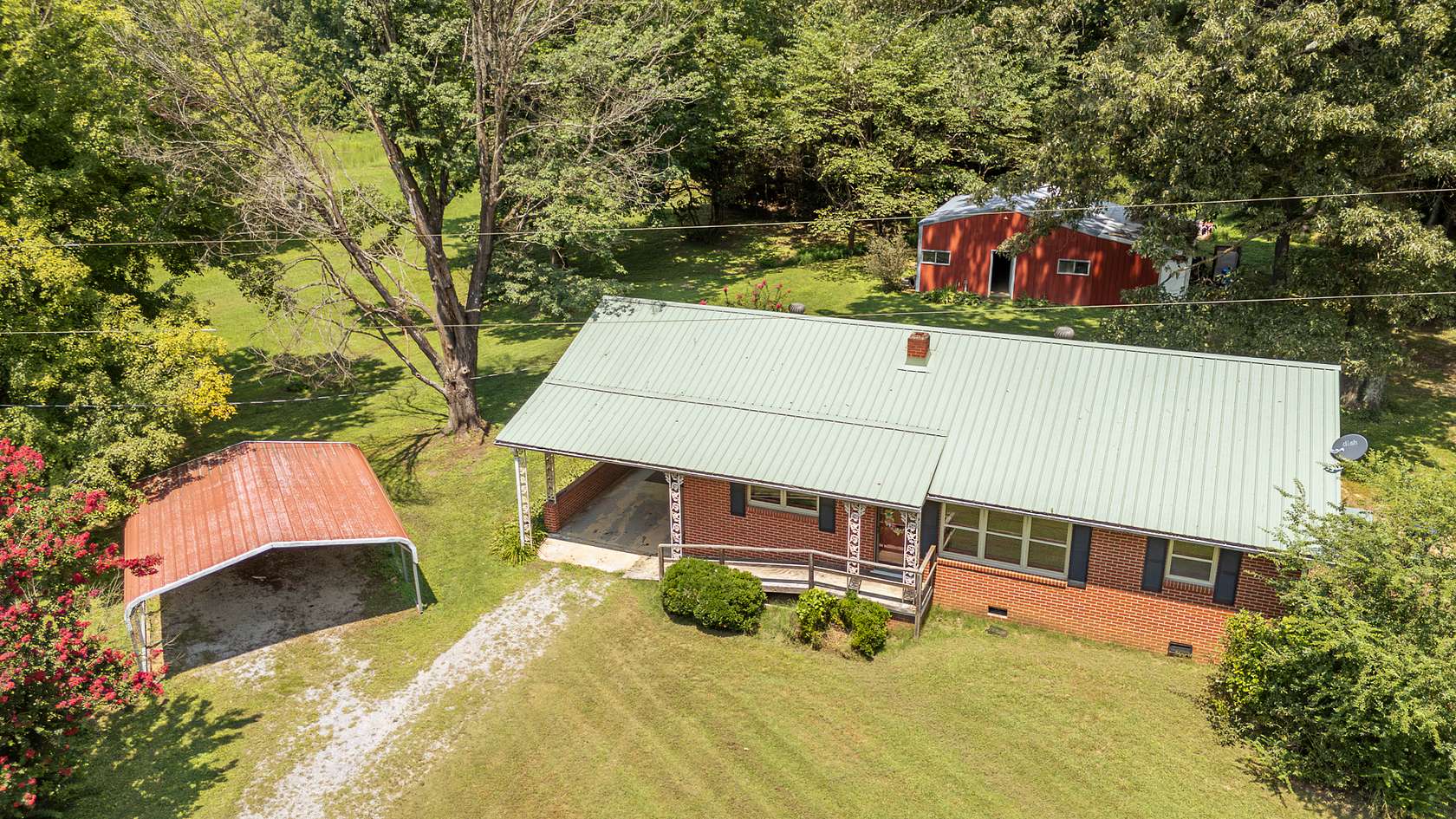 127 Acres of Land with Home for Sale in Dukedom, Tennessee