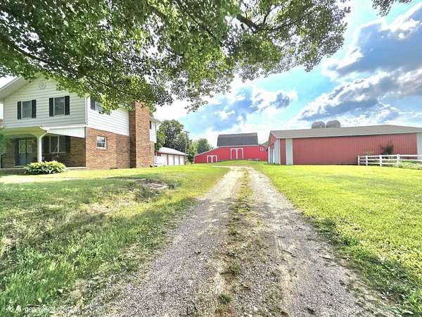 7.5 Acres of Land with Home for Auction in Burlington, Michigan