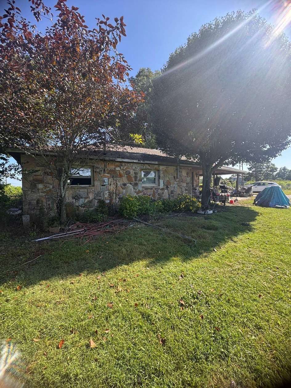 5.6 Acres of Land with Home for Sale in Crossville, Tennessee