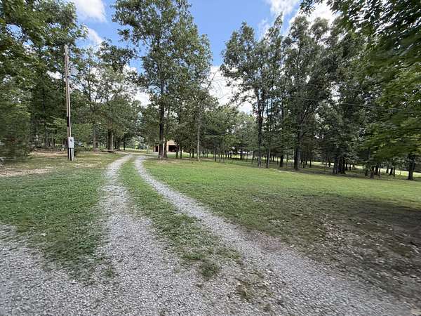 20 Acres of Recreational Land with Home for Sale in Alton, Missouri