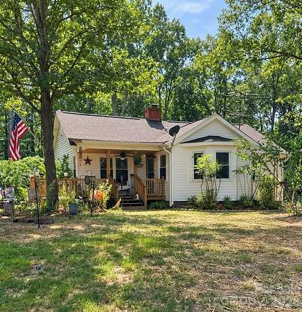 26.7 Acres of Land with Home for Sale in Peachland, North Carolina