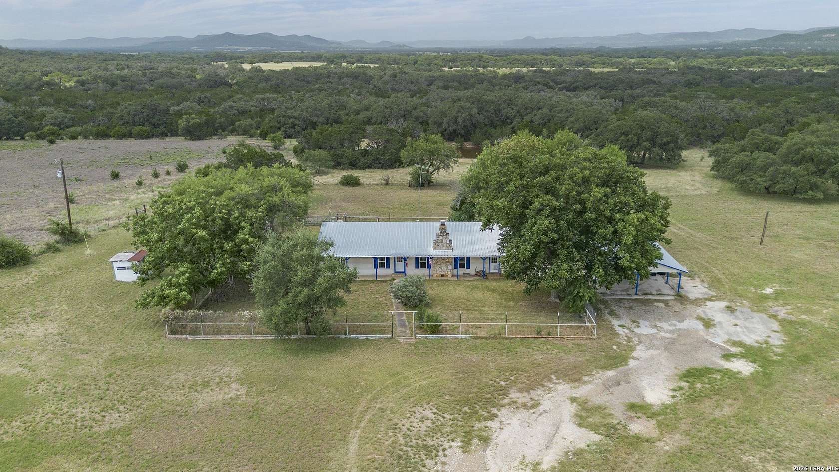 6.7 Acres of Land with Home for Sale in Utopia, Texas