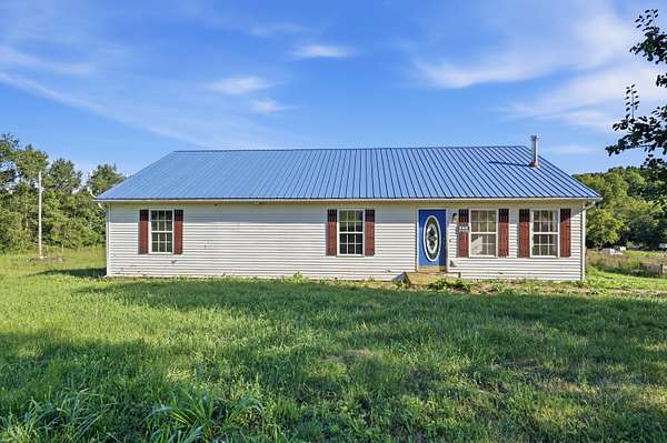 7 Acres of Land with Home for Sale in Sadieville, Kentucky