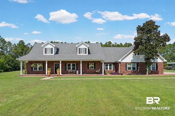 6.5 Acres of Land with Home for Sale in Summerdale, Alabama