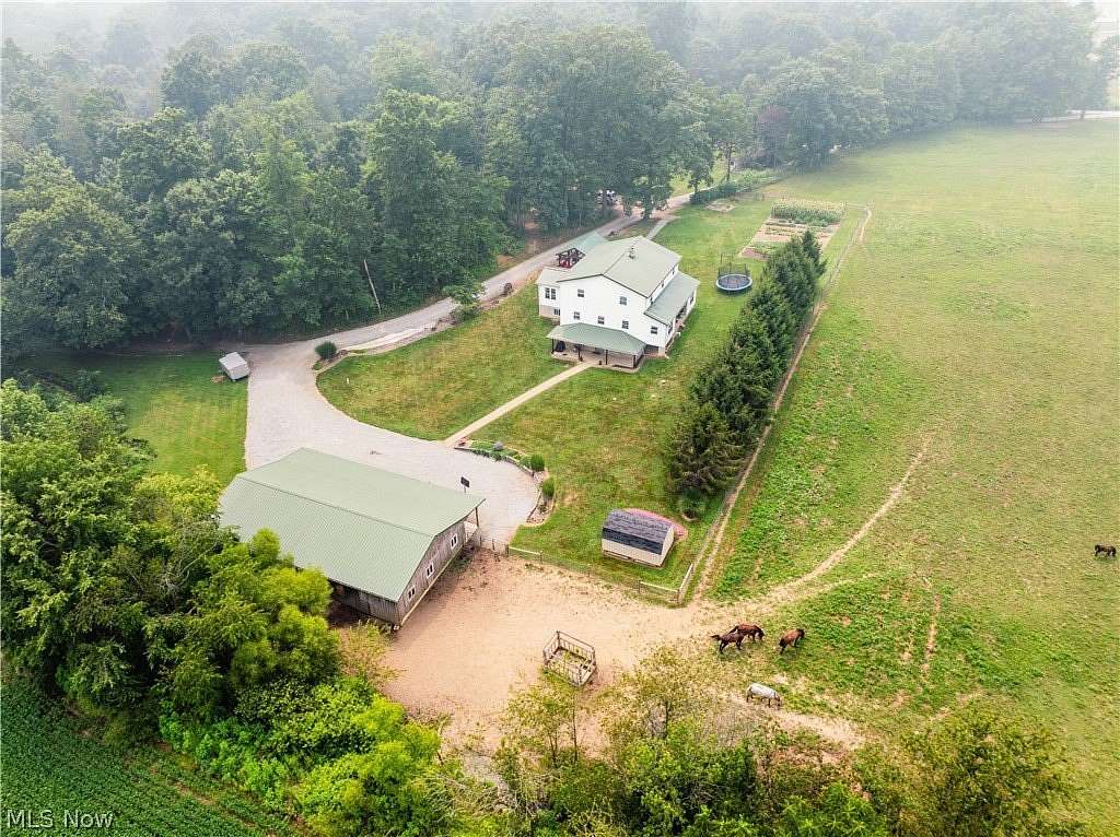6 Acres of Land with Home for Auction in Fredericksburg, Ohio