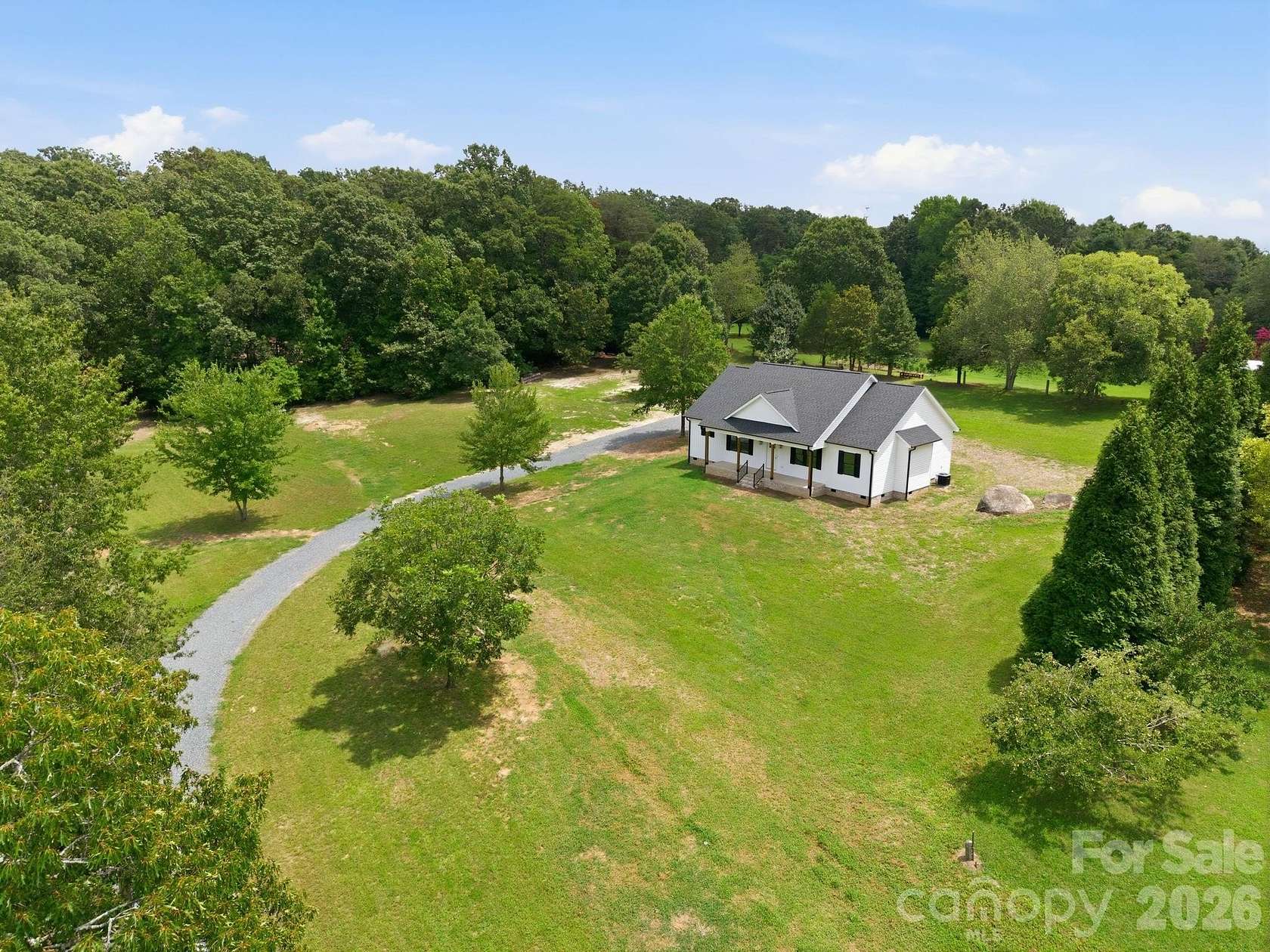 1.5 Acres of Land with Home for Sale in Faith, North Carolina