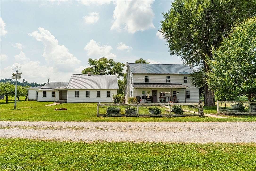 9.6 Acres of Land with Home for Auction in Millersburg, Ohio