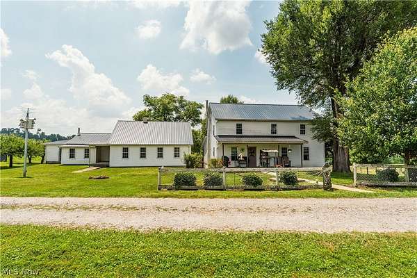 9.6 Acres of Land with Home for Auction in Millersburg, Ohio