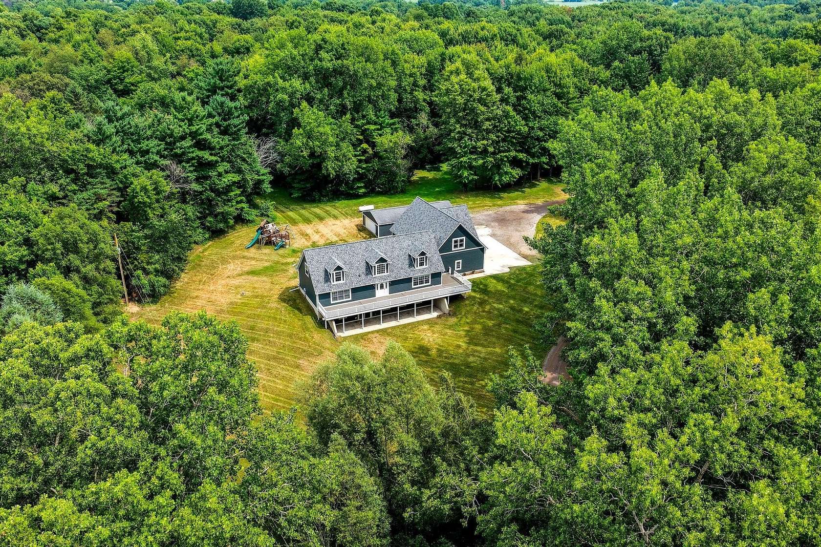 13.4 Acres of Recreational Land with Home for Sale in Grass Lake, Michigan