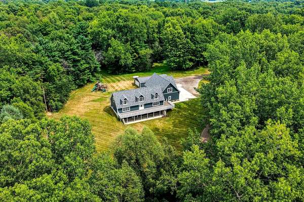 13.4 Acres of Recreational Land with Home for Sale in Grass Lake, Michigan
