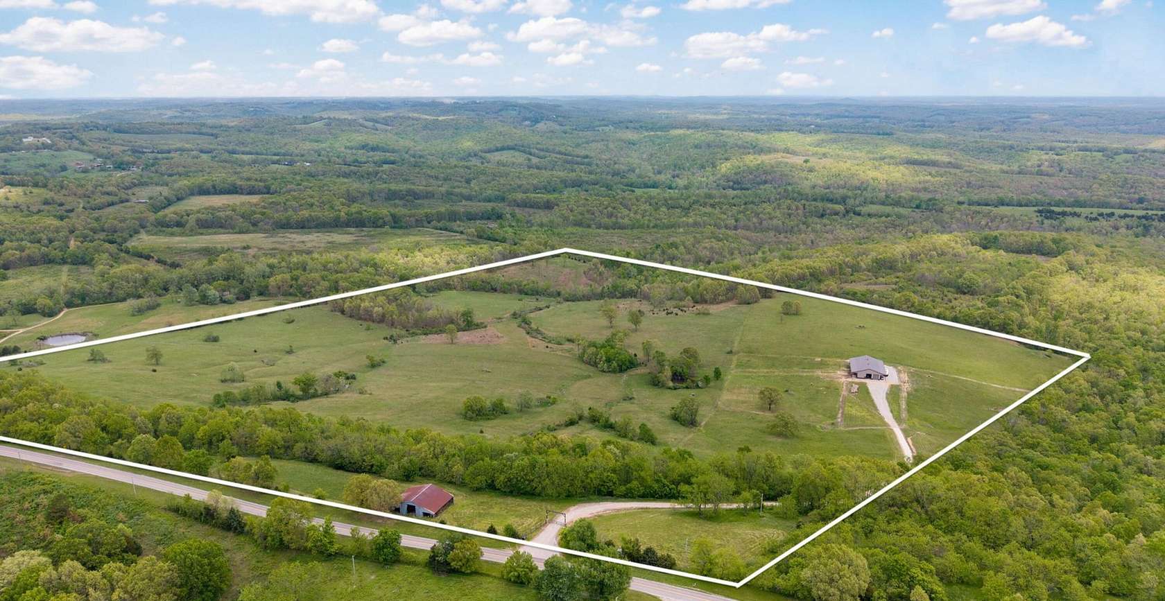 102 Acres of Land with Home for Sale in Oldfield, Missouri