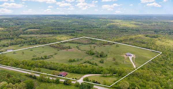 102 Acres of Land with Home for Sale in Oldfield, Missouri