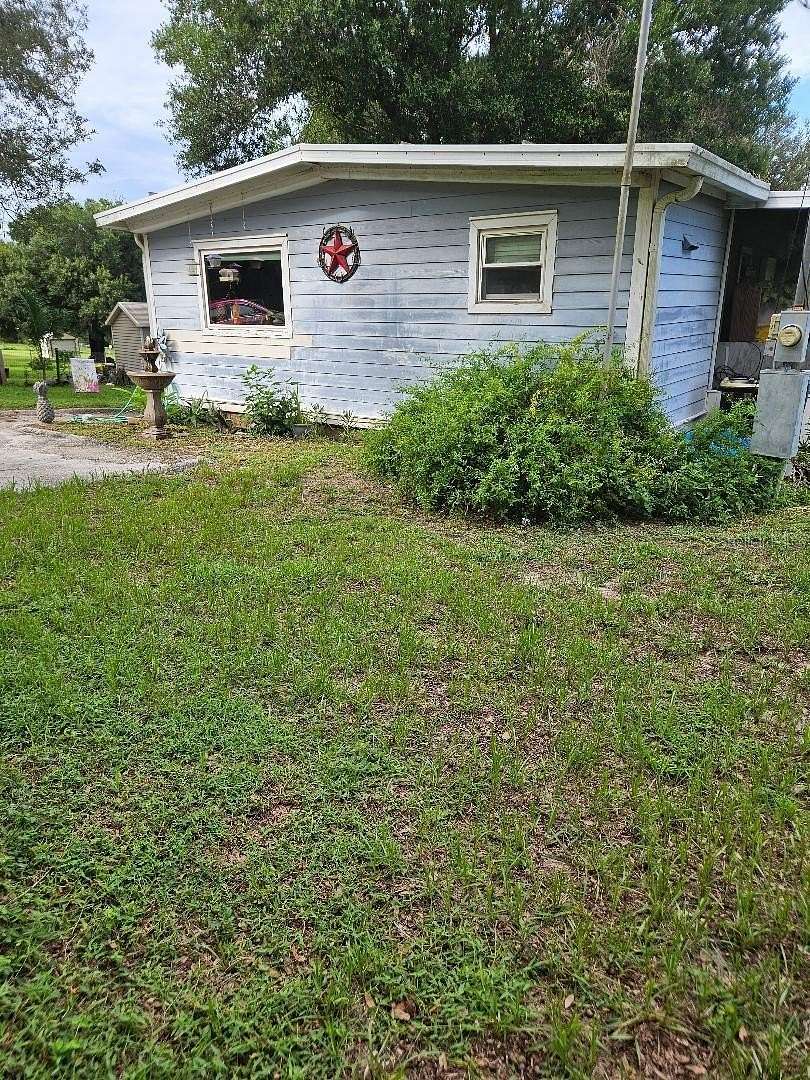 2.48 Acres of Land with Home for Sale in Polk City, Florida