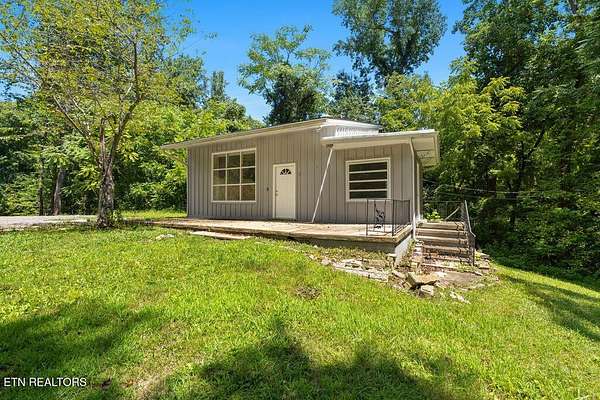 6.2 Acres of Land with Home for Sale in Knoxville, Tennessee