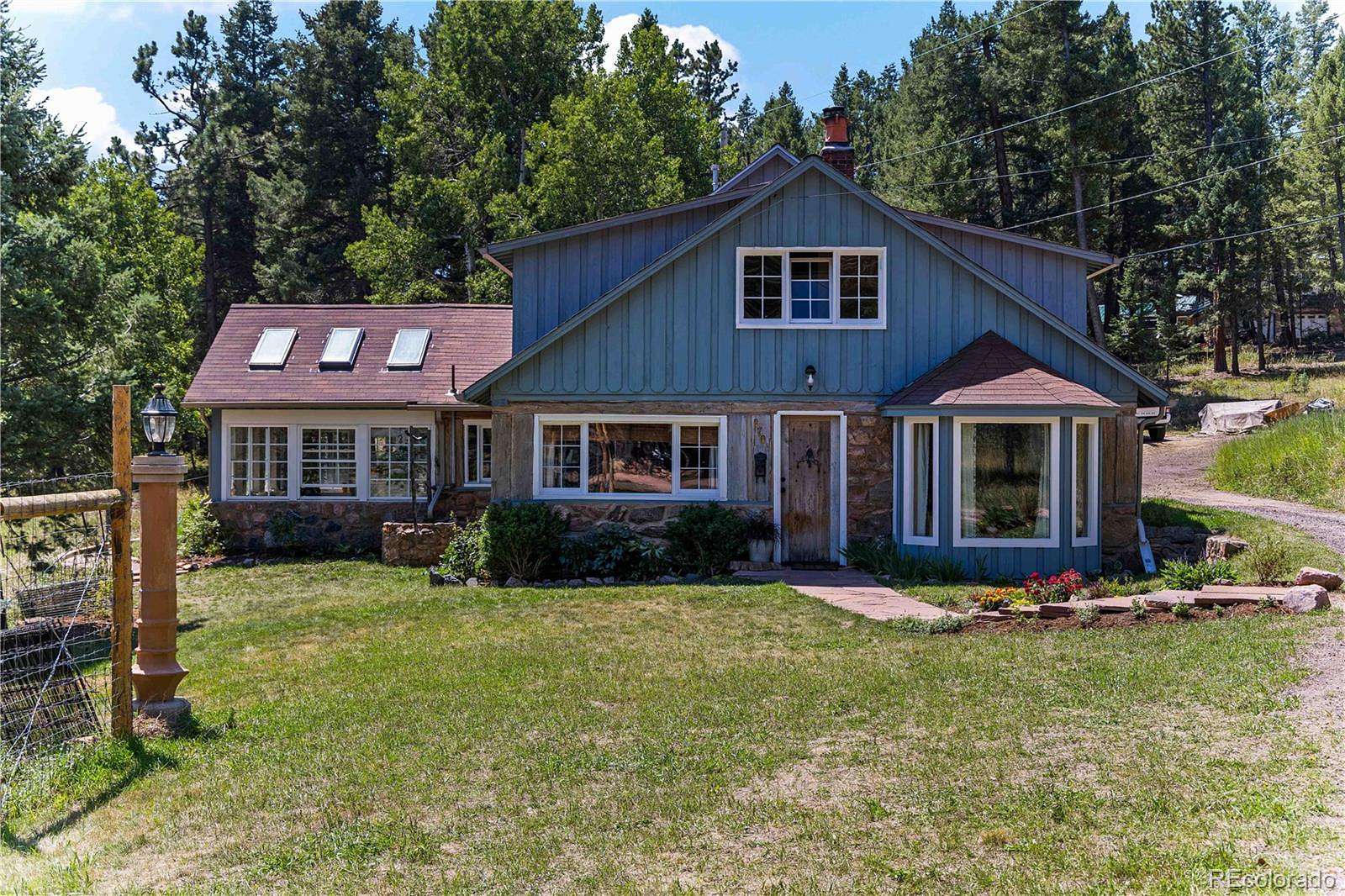 5.2 Acres of Land with Home for Sale in Evergreen, Colorado