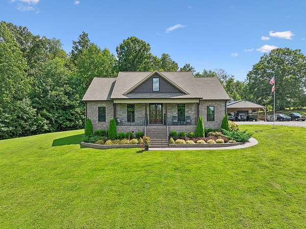 8.13 Acres of Land with Home for Sale in Cottontown, Tennessee