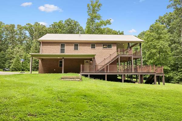 10 Acres of Recreational Land with Home for Sale in New Johnsonville, Tennessee