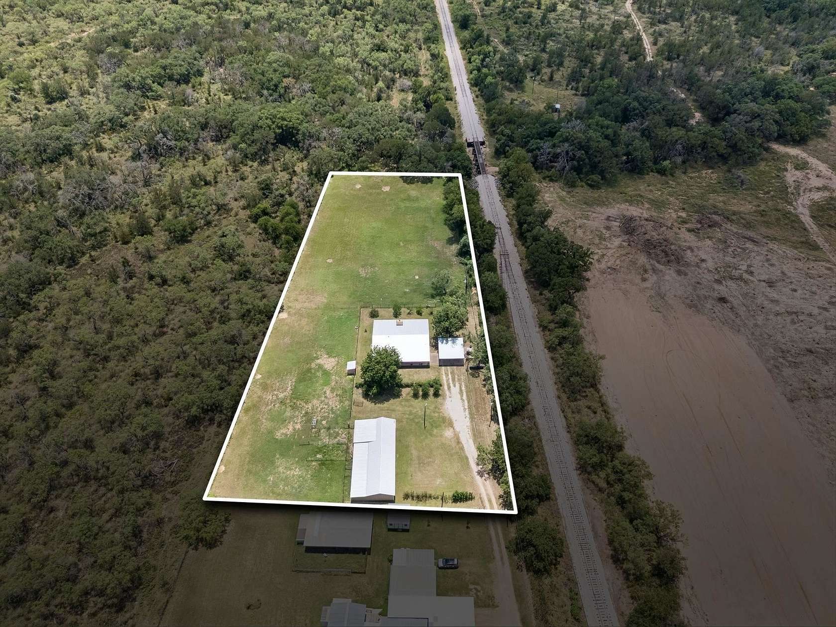 2.4 Acres of Land with Home for Sale in Marble Falls, Texas