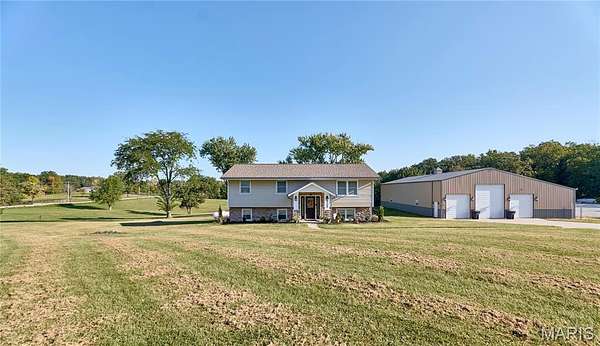 10 Acres of Recreational Land with Home for Sale in Troy, Missouri
