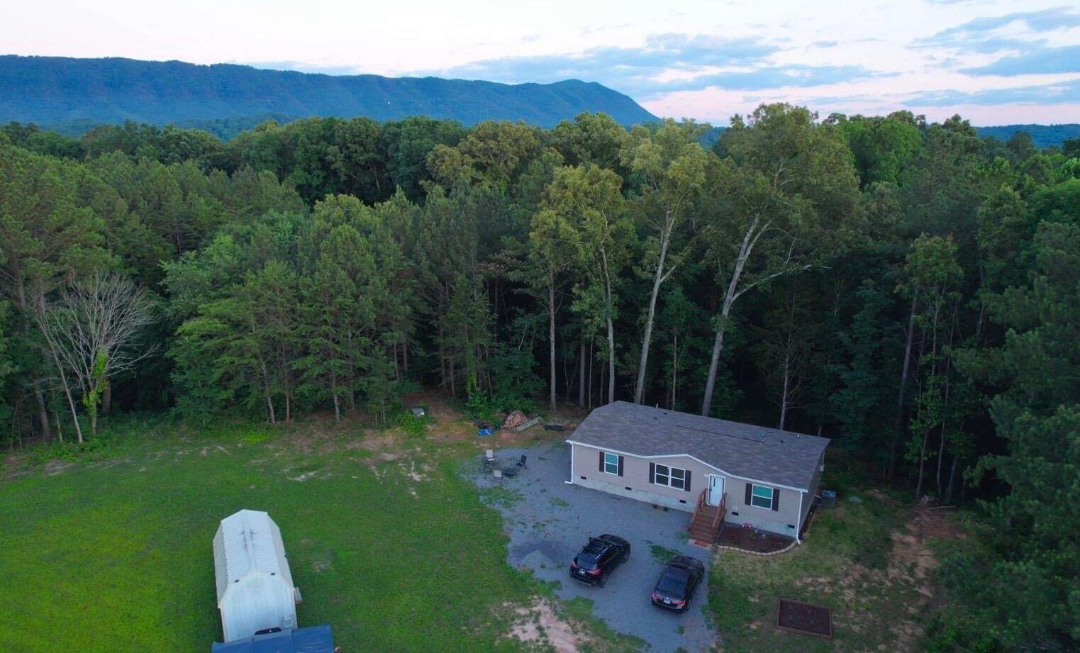 5 Acres of Land with Home for Sale in Benton, Tennessee