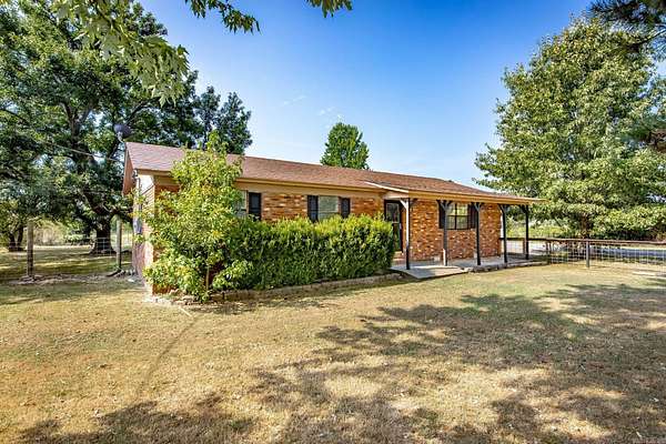 1.79 Acres of Land with Home for Sale in Atkins, Arkansas