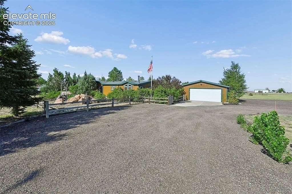 5 Acres of Land with Home for Sale in Peyton, Colorado