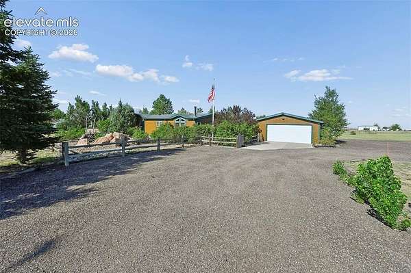 5 Acres of Land with Home for Sale in Peyton, Colorado