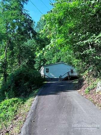 2 Acres of Land with Home for Sale in Lansing, North Carolina