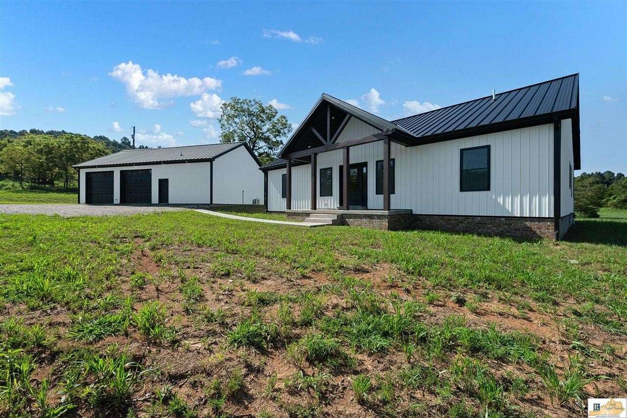 12.2 Acres of Land with Home for Sale in Cecilia, Kentucky